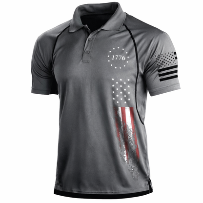 Gray polo shirt with American flag design and '1776' text on a white background